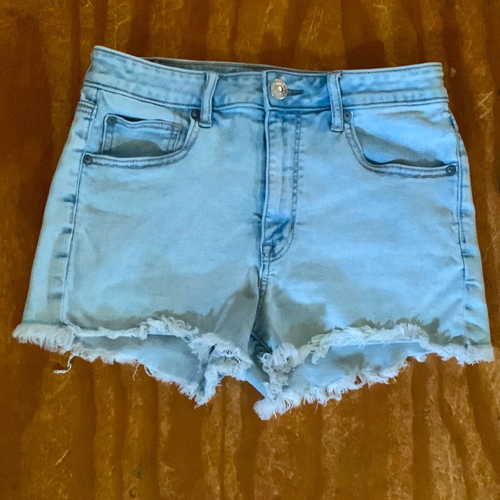 Light blue American Eagle size 8 shorts with frayed bottoms